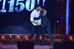 Chiranjeevi with son Ram Charan on stage at the Maa awards in HICC Hyderabad on 12th June 2016